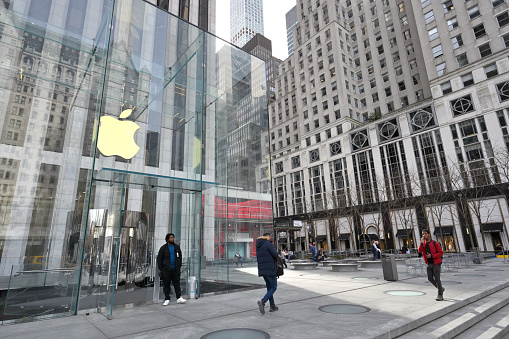 Tokyo, Japan - Customers within and outside Apple's Marunouchi store in Tokyo's business district.