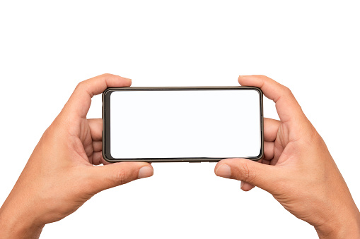 istock Man's hands hold smartphones horizontally to play a game or watch a movie, blank screen for additional user interface. Isolated image 1680592836
