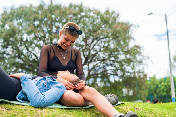 istock Lesbian couple are spending their free time in a park 1680619164