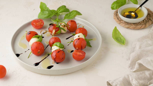 istock Caprese salad with tomato and mozzarella 1680626998