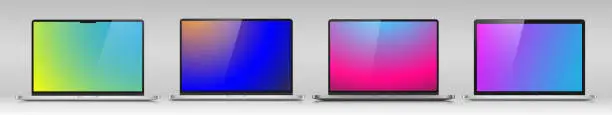 Vector illustration of Models of modern laptops with color gradient screens on a gray background.
