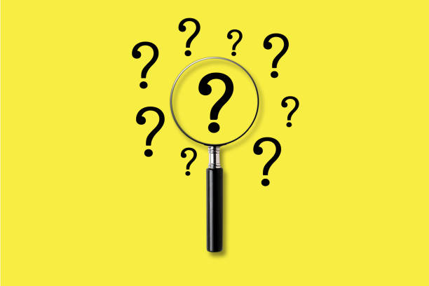 istock Magnifying glass with question mark symbol. on a yellow background. Searching concept. 1680640185