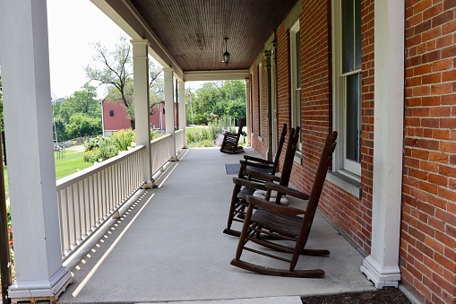 The empty rocking chairs on the front porch