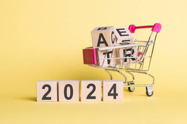 istock Wooden cubes with numbers 2024 yellow background 1680710281