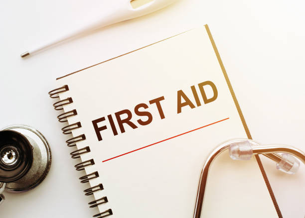 istock FIRST AID concept with text on medical notebook with stethoscope and thermometre 1680711896