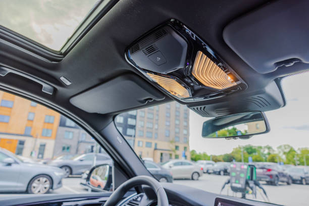 istock Close-up view of panoramic sunroof control panel in car with interior lights on 1680741648