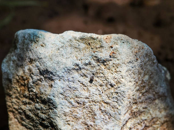Close up of stone object below the sun shadow, stone background for nature concept photography