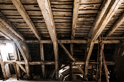 Ceilings removed showing bare rafters