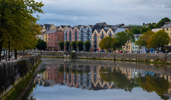 Colourful buildings reflected on river lee. Cork Ireland cityscape europe