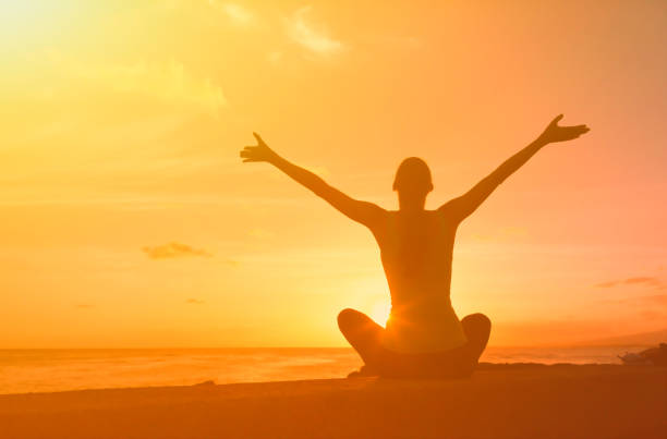 istock Woman feeling free at sunset. 1680781309