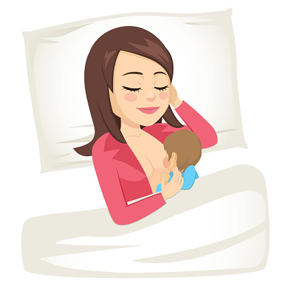 Young mom breastfeeding little newborn baby lying resting in bed