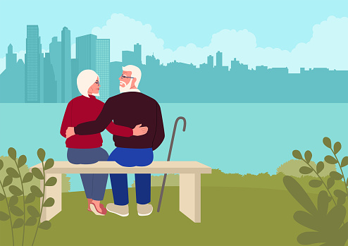 Elderly couple embracing on a city park bench, gazing at the serene city shore. Moment of love and togetherness, the beauty of long lasting relationships and the pleasures of life's simple joys