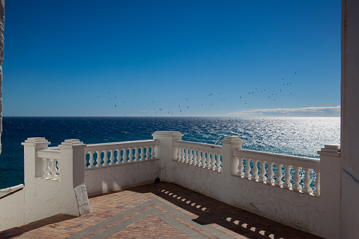 Sea view from the promenade above the beaches in the city of Ner in Nerja, Andalucía, Spain