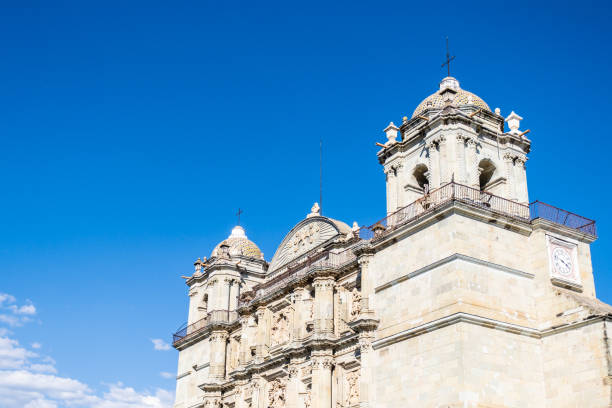 istock Colonial cathedral in Oaxaca, Mexico, against bright blue sky. 1680856251