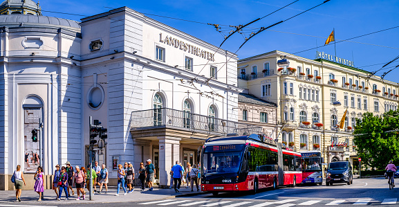 Salzburg, Austria - September 12: Historic buildings and bus at the old town of Salzburg on September 12, 2023