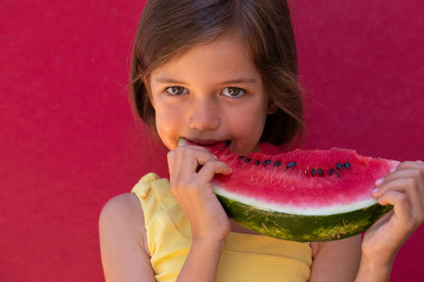istock Little Girl Eating Watermelon 1680876956