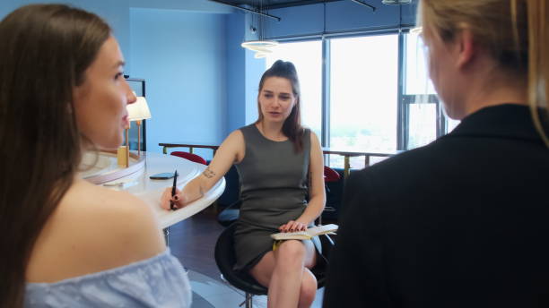 istock Young woman discuss work plan with colleagues during break 1680898923