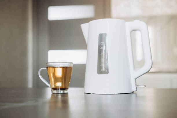 istock There is a white plastic teapot on the table together with a cup for brewing tea 1680905416