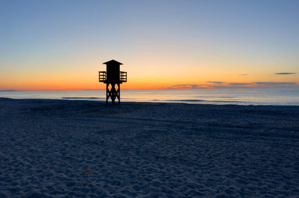 istock Lifeguard tower on beach on sunset. Miami Beach with lifeguard tower. 1680933911