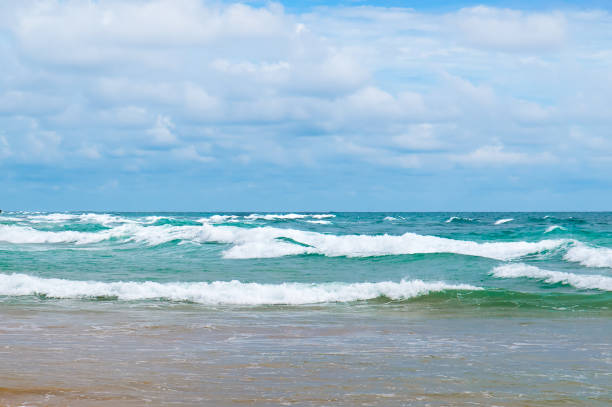 istock Tropical beach, blue sea and sky. 1680946052