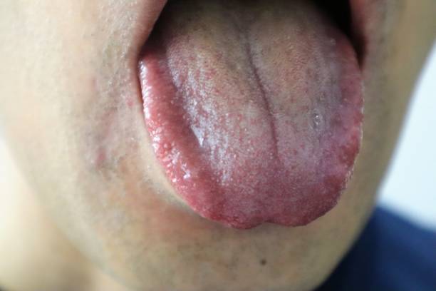 istock Japanese man sticking out his tongue 1680976066