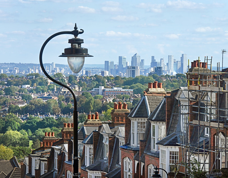 View from the London suburb of Muswell hill towards Crouch End and the distant Canary Wharf sky scrapers