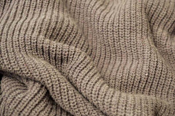 istock Crumpled warm brown knitted sweater 1681030884