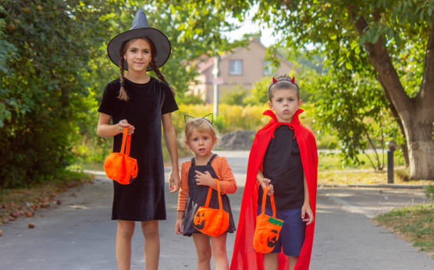 istock Children dressed in costumes for Halloween night. Selective focus. 1681032639