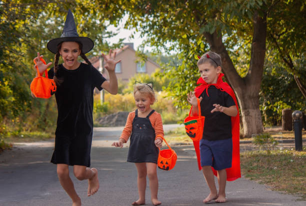 istock Children dressed in costumes for Halloween night. Selective focus. 1681032666