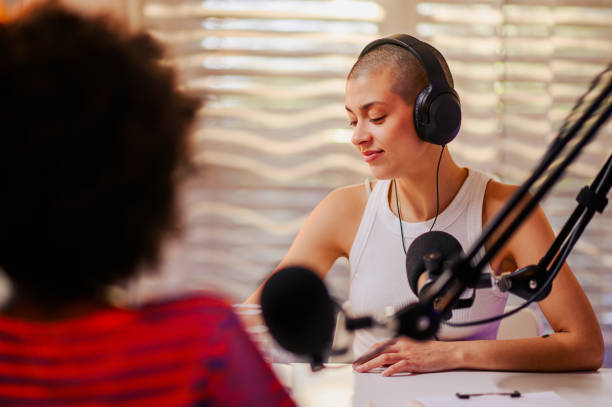 istock A podcast guest is sitting in a small recording studio 1681036298