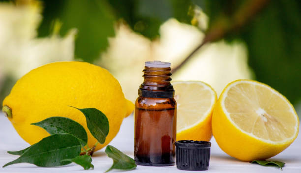 istock lemon oil in jars, fresh lemon. Selective focus. 1681062849