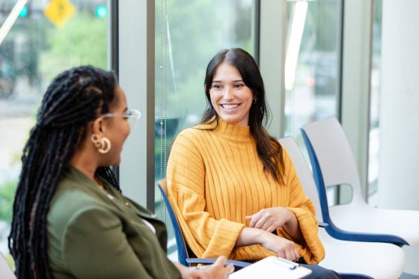 istock Cheerful young woman smiles at therapist during session 1681105164