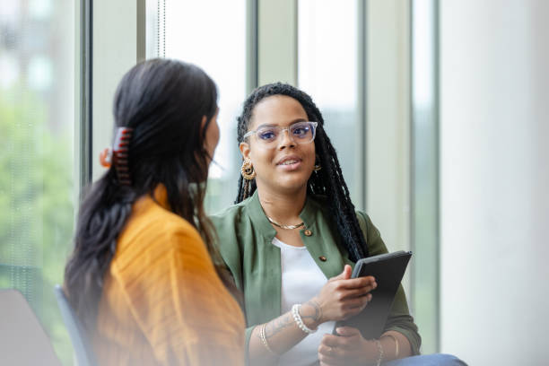 istock Therapist listens attentively to female client 1681105196