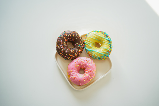 colorful donuts on plate