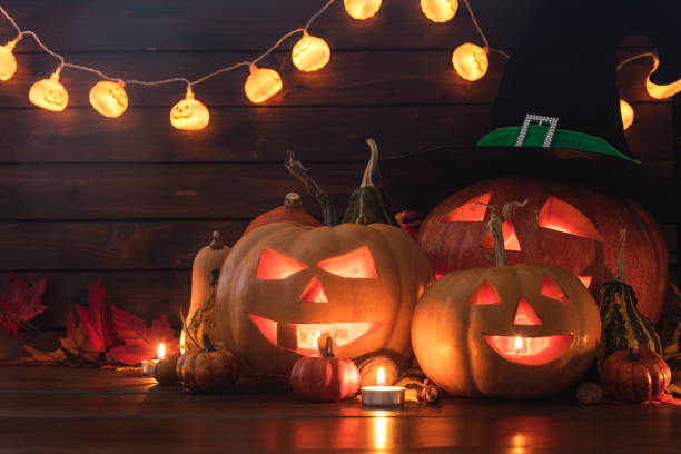 istock Jack O’ Lanterns on The Old Wooden Background 1681126170