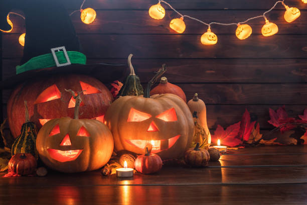 istock Jack O’ Lanterns on The Old Wooden Background 1681126564