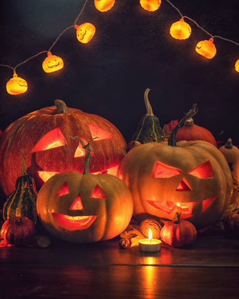 istock Jack O’ Lanterns on The Old Wooden Background 1681126578