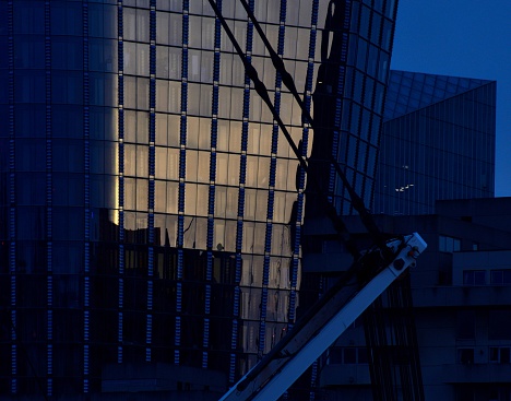 Building detail reflected at twilight