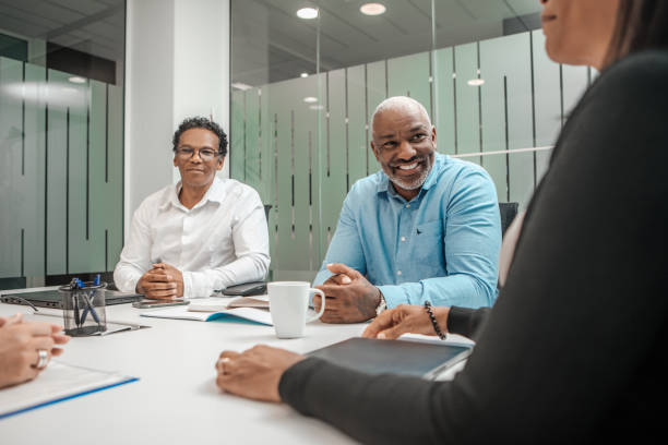 istock Successful over 40s black businessman leading a group office meeting 1681153098
