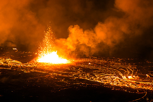 View into the lava lake inside the crater of Nyiragongo volcano – this is the largest lava lake on earth. \n\nThe 3470 m high volcano Nyiragongo belongs to the group of Virunga volcanoes in the border triangle of DR Congo, Uganda and Rwanda and is one of the most dangerous volcanoes on earth. The nearby city of Goma (the capital of the Congolese province of North Kivu) is constantly threatened by the nearby volcano.