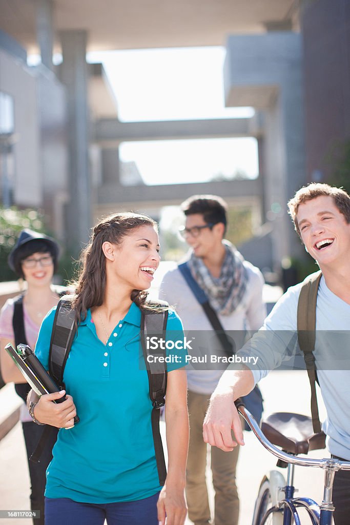 Students walking together outdoors  Connection Stock Photo