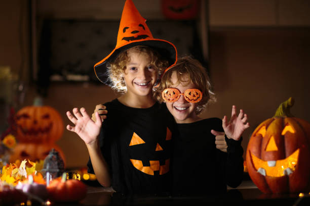 istock Family decorating home. Halloween arts and crafts. 1681202017