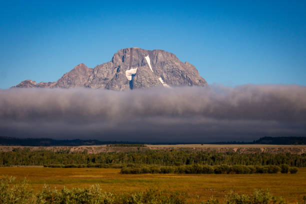 Mt Moran Above Foggy Snake River Valley stock photo