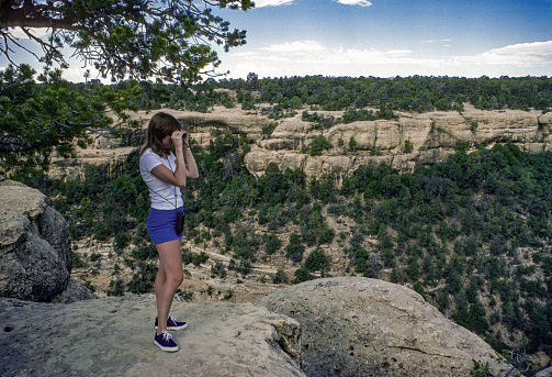 Mesa Verde NP - Young Woman at Overlook Near Balcony House - 1977. Scanned from Kodachrome 25 slide.