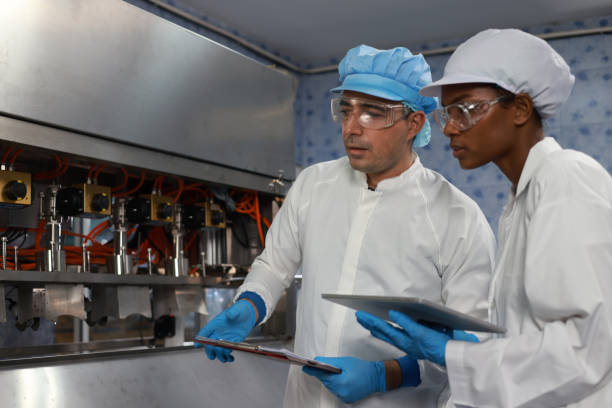 istock Two scientists sampling check the quality of drinking water during the process of running 1681285617
