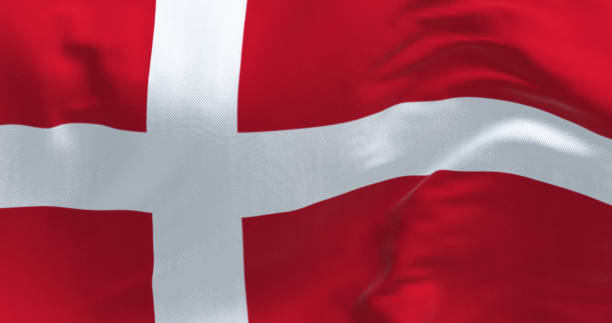 istock Denmark national flag waving on a clear day 1681299804