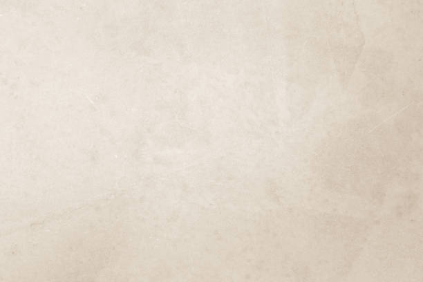 istock Colour old concrete wall texture background. Close Up retro plain cream color cement wall background texture. Design paper vintage parchment element show or advertise or promote product on display. 1681426433