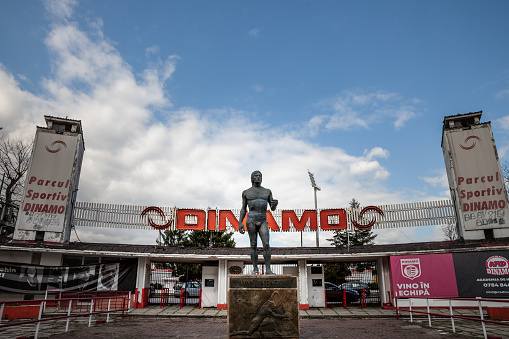 Picture of the statue of Ivan Patzaichin in front of the entrance to the parcul sportiv Dinamo Bucuresti in bucharest, Romania. SC Dinamo 1948, commonly known as Dinamo Bucureti or simply Dinamo, is a Romanian professional football club based in Bucharest, that competes in the Liga I.