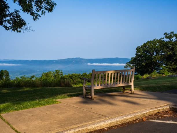 istock Bench lit by the setting sun overlooking the Shenandoah Valley at the Dickey Ridge Visitor Center in Shenandoah National Park, Virginia, USA. 1681459735