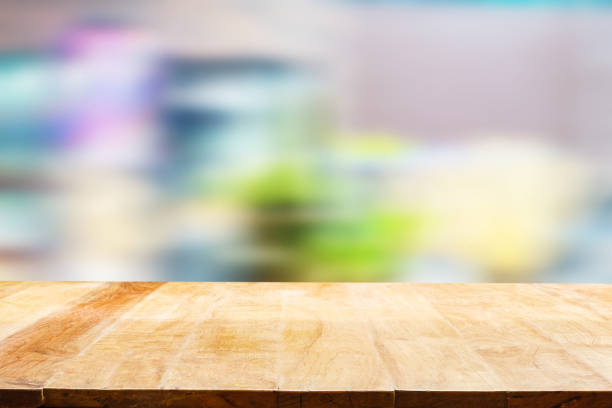 istock Empty wooden table background filled with beautiful plants, cacti and succulents. 1681527344